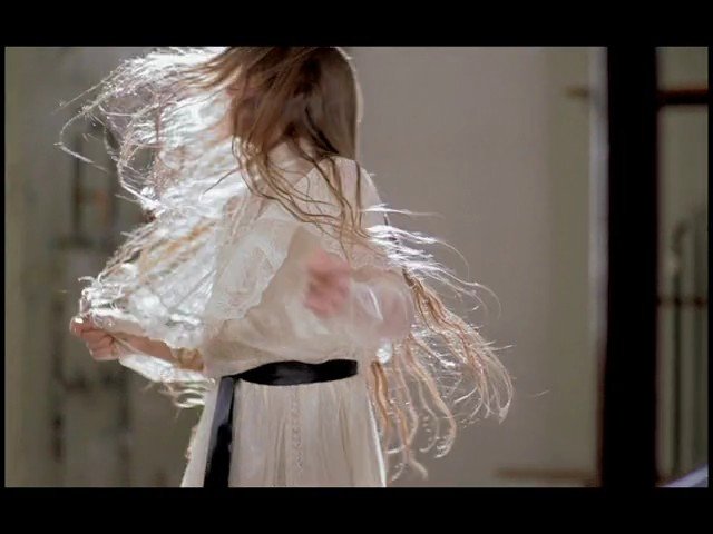 Video Reference: person, dress, spinning, motion blur, long hair, indoor, dance, flowing fabric, light clothing, movement, portrait, interior