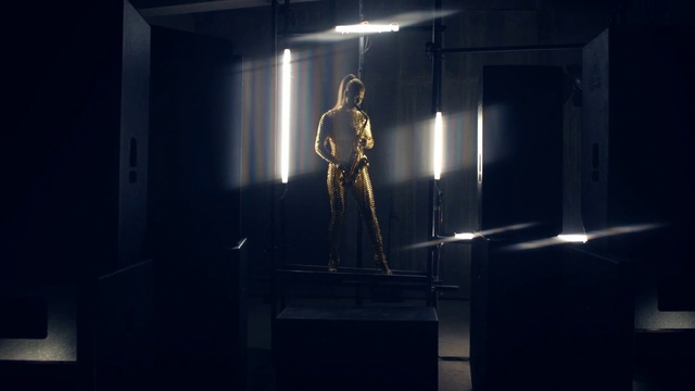 Video Reference: Art, Performing arts, Fashion design, Event, Space, Entertainment, Darkness, Electric blue, Room, Symmetry