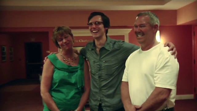 Video Reference: Smile, Facial expression, Happy, T-shirt, Leisure, Friendship, Event, Eyewear, Fun, Formal wear