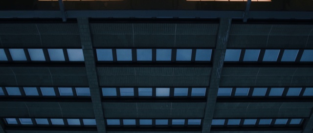 Video Reference: Building, Window, Rectangle, Grey, Tower block, Font, Facade, Tints and shades, Parallel, Commercial building