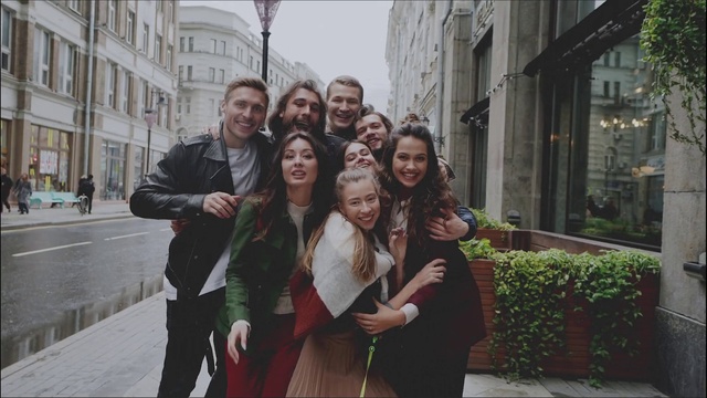 Video Reference: Smile, Building, Plant, Temple, Happy, Social group, Travel, Public space, Street fashion, Fun