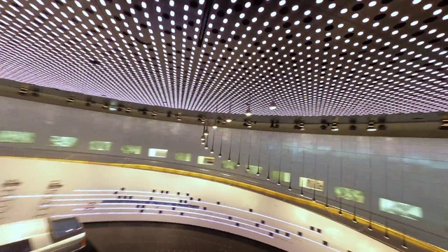 Video Reference: Light, Building, Lighting, Architecture, Line, City, Metropolitan area, Ceiling, Metal, Urban design