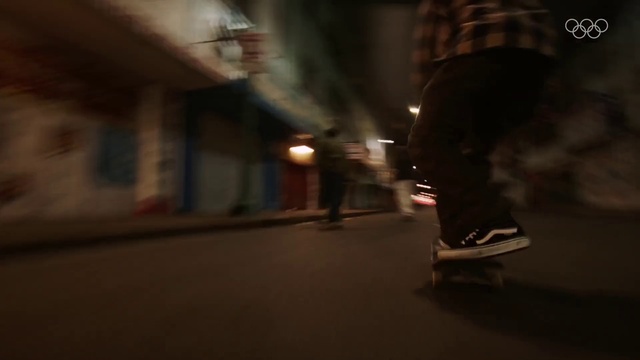 Video Reference: Flash photography, Skateboard truck, Kickflip, Sports equipment, Asphalt, Rolling, Skateboarder, Skateboard, Automotive lighting, Tints and shades