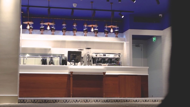 Video Reference: Cabinetry, Flooring, Shelving, Kitchen, Shelf, Barware, Display case, Glass, Countertop, Building