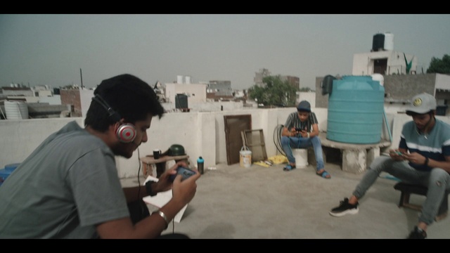 Video Reference: Hairstyle, Sky, Fun, Recreation, T-shirt, Event, Eyewear, Travel, Baseball cap, Leisure