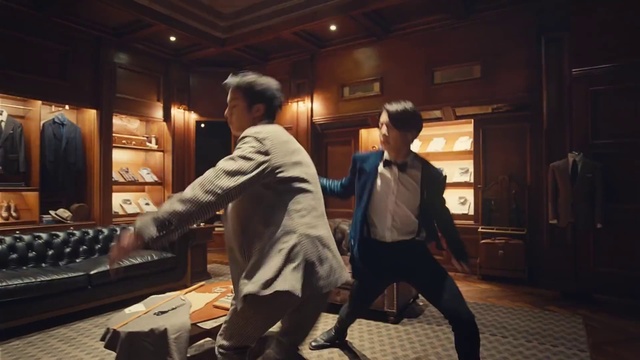 Video Reference: Entertainment, Flooring, Event, Couch, Formal wear, Performing arts, Fashion design, Chair, Fun, Suit