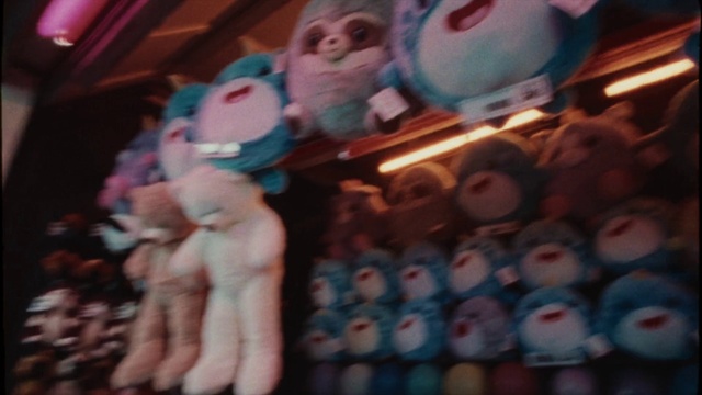 Video Reference: Toy, Event, Plastic, Design, Electric blue, Fun, Carmine, Fictional character, Sweetness, Collection