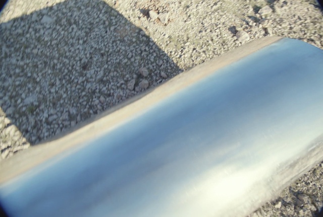 Video Reference: Hood, Automotive tire, Automotive exterior, Asphalt, Tints and shades, Road surface, Vehicle door, Landscape, Road, Tar