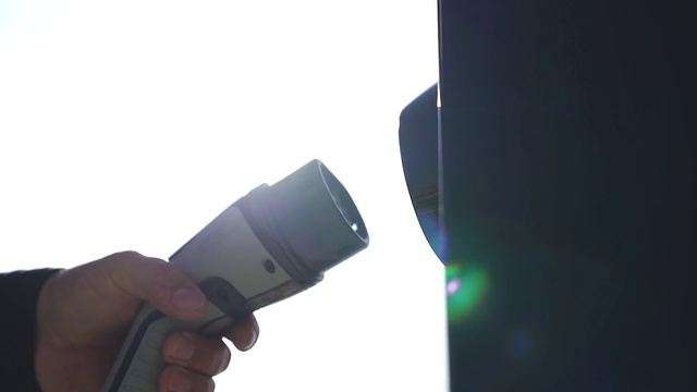 Video Reference: Hand, Sky, Automotive lighting, Street light, Gesture, Communication Device, Cloud, Rectangle, Portable communications device, Tints and shades