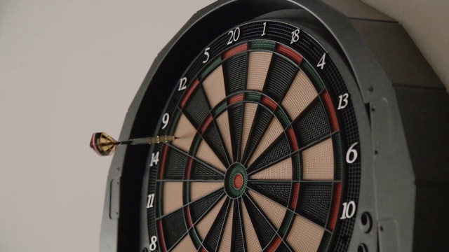 Video Reference: Dartboard, Darts, Automotive tire, Automotive design, Alloy wheel, Indoor games and sports, Rim, Door, Spoke, Automotive exterior