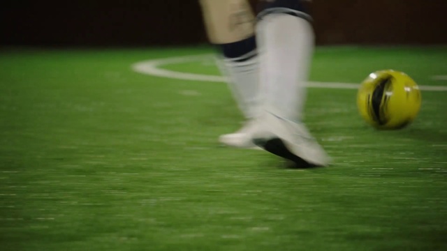 Video Reference: Sports equipment, Football, Sports gear, Ball, Knee, Football equipment, Ball game, Grass, Flooring, Sportswear