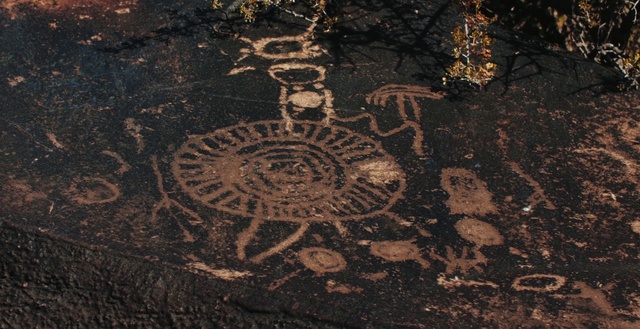 Video Reference: Brown, Road surface, Organism, Font, Asphalt, Art, Pattern, Circle, Soil, Visual arts