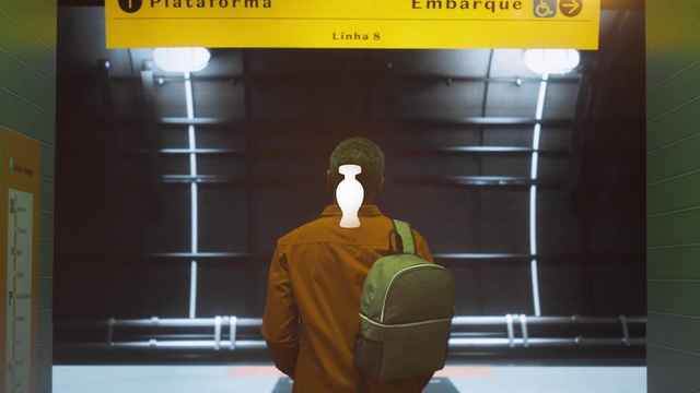 Video Reference: Yellow, Sleeve, Font, Art, Event, Personal protective equipment, Fictional character, Sportswear, T-shirt, Animation