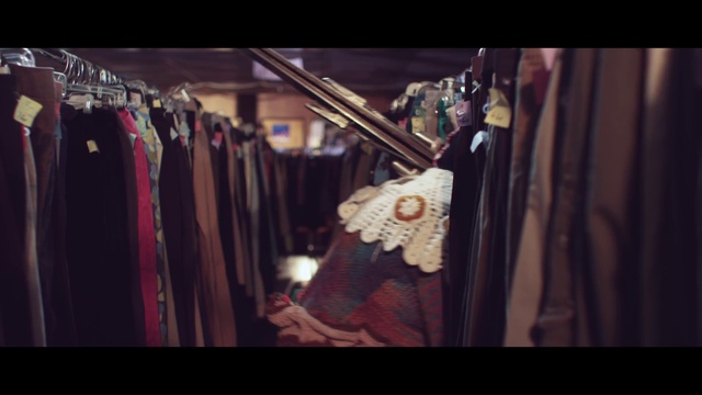 Video Reference: Purple, Sleeve, Closet, Clothes hanger, Fashion design, Magenta, Event, T-shirt, Street fashion, Formal wear