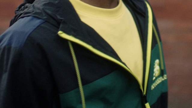 Video Reference: Outerwear, Jersey, Sleeve, Street fashion, Grey, Sportswear, Sunglasses, T-shirt, Font, Electric blue