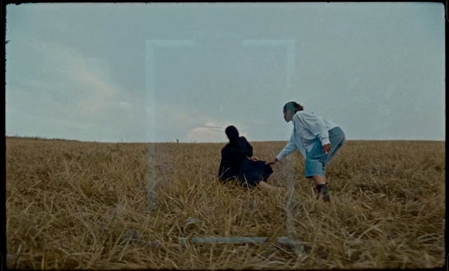 Video Reference: Plant, Sky, Ecoregion, Gesture, People in nature, Plain, Agriculture, Grass, Happy, Grassland