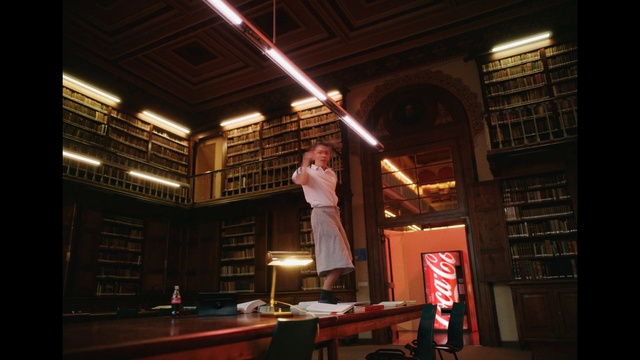 Video Reference: Table, Entertainment, Interior design, Performing arts, Stage, Event, Music venue, Performance, Audio equipment, Darkness