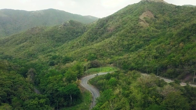 Video Reference: Mountain, Sky, Plant, Natural landscape, Cloud, Landscape, Road, Forest, Valley, Mountain range