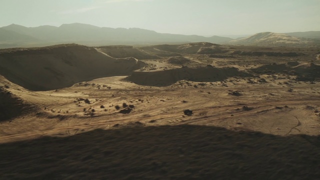 Video Reference: Sky, Mountain, Slope, Highland, Terrain, Horizon, Grassland, Formation, Plain, Landscape