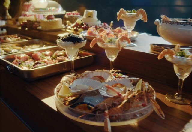 Video Reference: buffet, seafood, shrimp, shellfish, salad, dessert, banquet, restaurant, party, platter, cocktail, catering, food display, fancy, dining, table