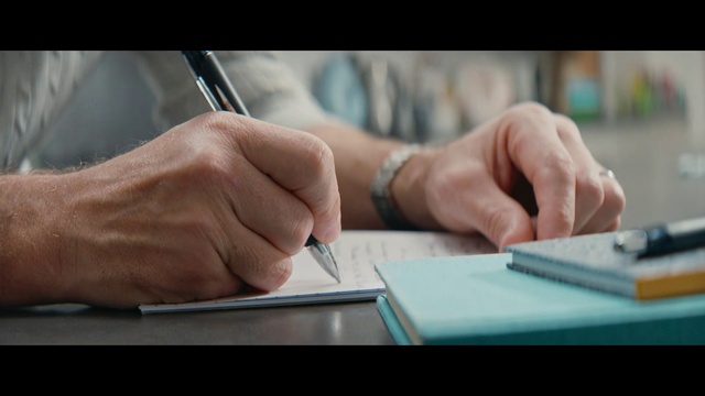 Video Reference: Hand, Table, Writing instrument accessory, Office supplies, Gesture, Finger, Writing implement, Pen, Automotive design, Font