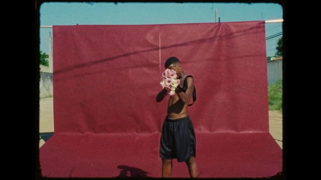 Video Reference: Shorts, Microphone, Pink, Leisure, Performing arts, Magenta, Tints and shades, Rectangle, Event, Entertainment