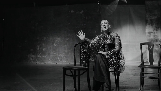 Video Reference: Furniture, Chair, Black, Flash photography, Style, Entertainment, Black-and-white, Performing arts, Monochrome, Event