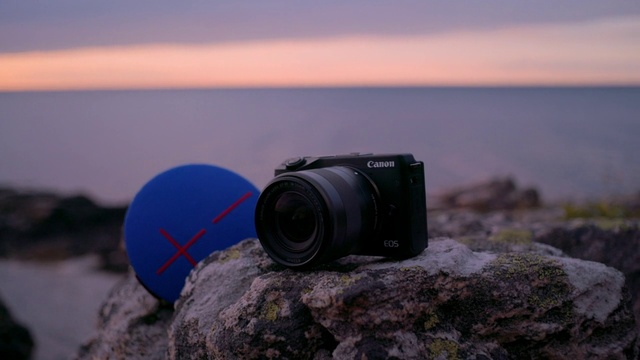 Video Reference: Sky, Camera, Camera lens, Reflex camera, Digital camera, Flash photography, Point-and-shoot camera, Camera accessory, Digital SLR, Cameras & optics