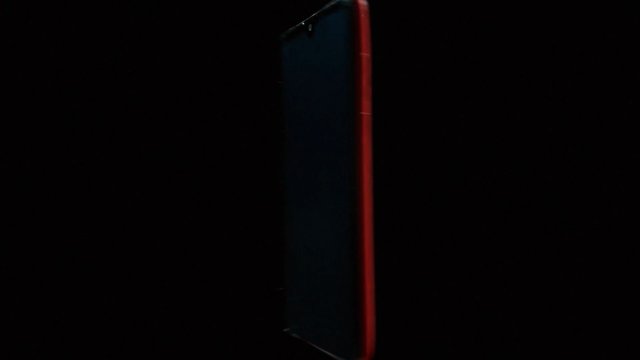 Video Reference: dark, abstract, red light, rectangular object, edge, minimal, black background, close-up, low light