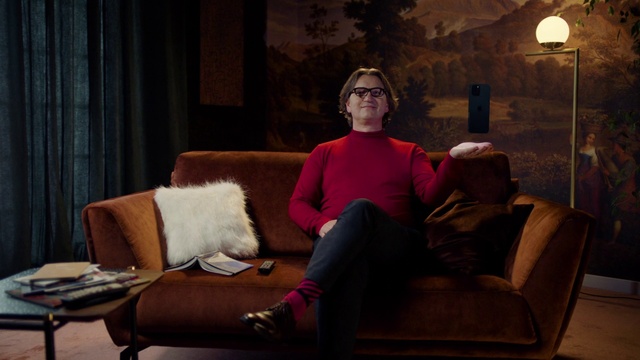 Video Reference: Furniture, Couch, Comfort, Leg, Curtain, Lighting, Flash photography, Wood, Interior design, Living room