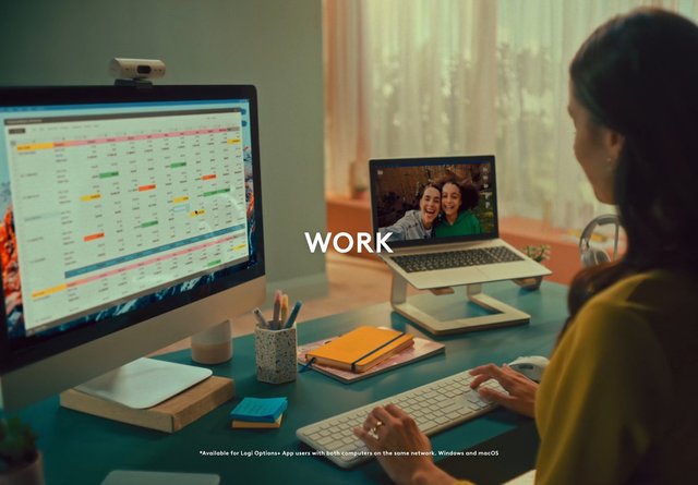 Video Reference: home office, remote work, desktop computer, laptop, video call, calendar, desk, keyboard, workspace, productivity, dual screen, woman, computer monitor, notebook, office setup, working from home