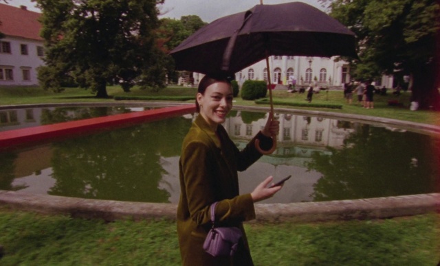 Video Reference: Smile, Plant, Water, Botany, Sky, Temple, Tree, Umbrella, Gesture, Grass