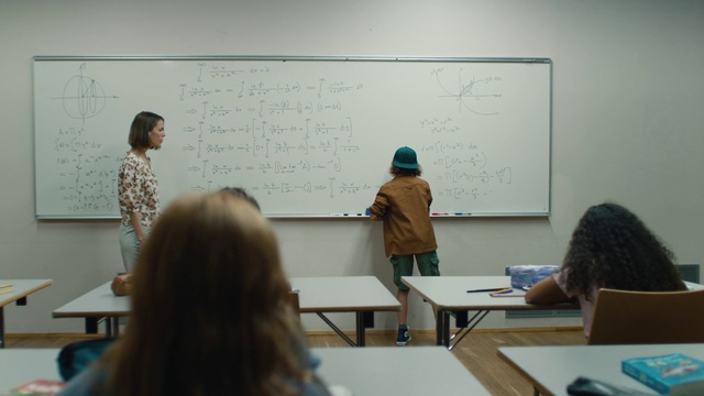 Video Reference: Table, Whiteboard, Human, Handwriting, Service, Class, Presentation, Teacher, Desk, Event