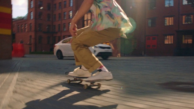 Video Reference: Footwear, Wheel, Sports equipment, Leg, Car, Skateboard, Skateboarder, Tire, Kickflip, Skateboard truck