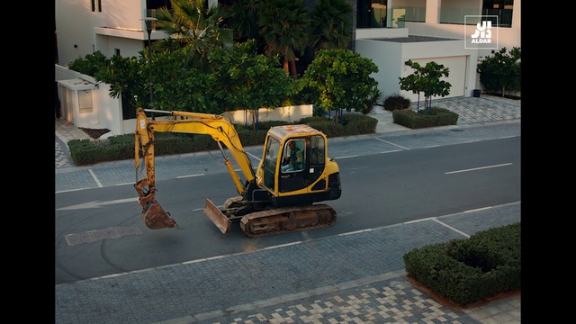 Video Reference: Plant, Road surface, Asphalt, Vehicle, Urban design, Motor vehicle, Window, Grass, Sidewalk, Road