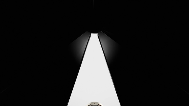 Video Reference: Triangle, Black-and-white, Symmetry, Font, Tints and shades, Parallel, Monochrome, Monochrome photography, Darkness, Cone