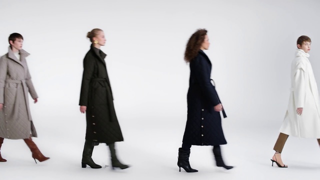 Video Reference: Overcoat, Sleeve, Gesture, Collar, Pantsuit, Fashion design, Blazer, Formal wear, Trench coat, Knee