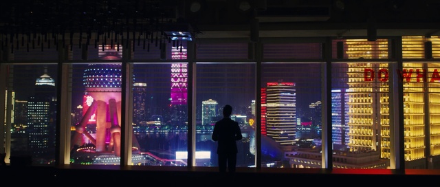 Video Reference: Building, Skyscraper, Purple, Electricity, Standing, Electronic signage, Font, Tower block, City, Display device