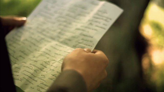 Video Reference: Brown, Hand, Handwriting, Gesture, Writing instrument accessory, Finger, Font, Publication, Material property, Writing