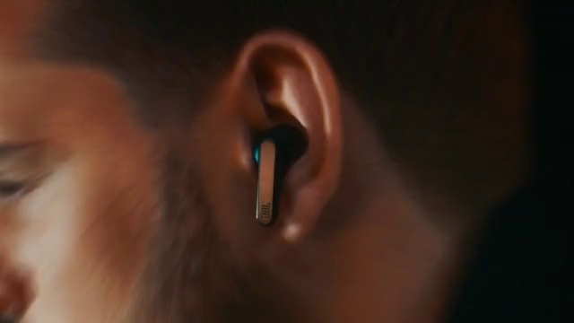 Video Reference: Eyelash, Jaw, Flash photography, Ear, Beard, Gesture, Facial hair, Electric blue, Darkness, Wrinkle