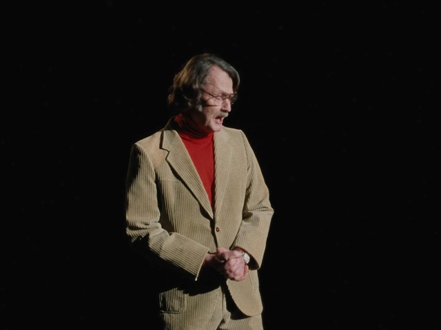 Video Reference: Sleeve, Audio equipment, Beard, Blazer, Entertainment, Performing arts, Spokesperson, Event, Speech, Formal wear