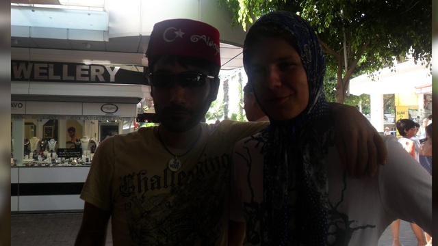 Video Reference: Hairstyle, Cap, Eyewear, Cool, Baseball cap, Fun, T-shirt, Smile, Event, Personal protective equipment