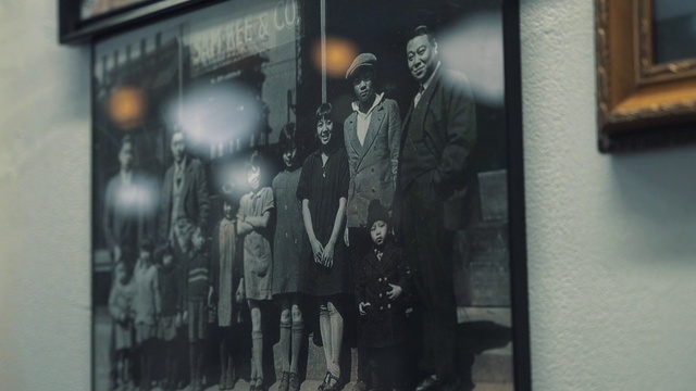 Video Reference: Art, Font, Suit, Facade, Visual arts, Event, Monochrome photography, Monochrome, Advertising, Street fashion