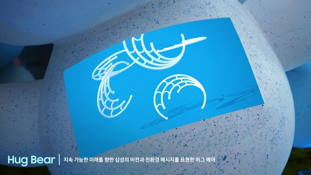 Video Reference: Azure, Font, Aqua, Material property, Electric blue, Circle, Logo, Symbol, Automotive design, Graphics