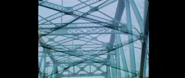 Video Reference: Sky, Triangle, Electricity, Engineering, Symmetry, Pattern, Rectangle, Public utility, Electric blue, Overhead power line