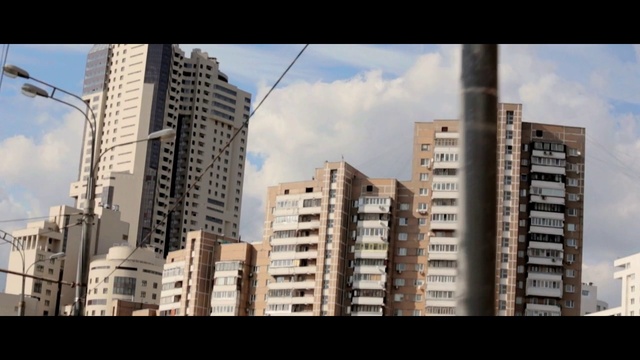 Video Reference: Cloud, Sky, Building, Daytime, Skyscraper, Window, Tower block, Urban design, Fixture, Neighbourhood