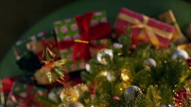 Video Reference: Christmas tree, Christmas ornament, Holiday ornament, Gold, Ornament, Evergreen, Christmas decoration, Holiday, Event, Christmas