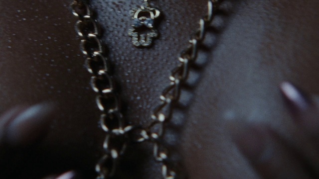Video Reference: Shoe, Silver, Headgear, Bicycle part, Jewellery, Embellishment, Font, Pattern, Metal, Electric blue