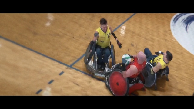 Video Reference: Field house, Sports gear, Disabled sports, Wood, Wheelchair sports, Flooring, Hardwood, Player, Tournament, Chair