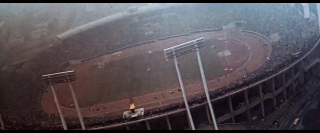 Video Reference: Automotive lighting, Hood, Automotive tire, Automotive exterior, Landscape, Windshield, Glass, Automotive window part, Road, Metal